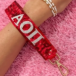 AO PI SEQUIN KEY STRAP